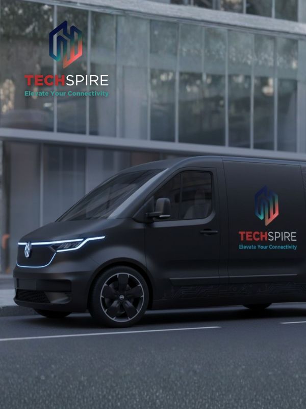 Black TECHSPIRE company van with colorful logo and slogan in front of office building, created by Dutch visual storyteller and digital designer Dirk van Eck